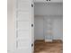Walk in closet with wooden floors, shelving and plenty of storage space at 250 Pilot Ridge Rd, Zebulon, NC 27597