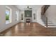 Bright living room with hardwood floors, fireplace, and natural light, creating an inviting atmosphere at 250 Pilot Ridge Rd, Zebulon, NC 27597