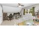 Large multi purpose room with multiple tables and a dormered ceiling at 2700 Ross Rd, Durham, NC 27703