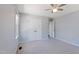 Spacious bedroom features double closets, neutral carpet, and ceiling fan at 283 Raynor Rd, Spring Lake, NC 28390