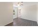 Bright bedroom with neutral walls, hardwood floors, and a ceiling fan providing a serene living space at 283 Raynor Rd, Spring Lake, NC 28390
