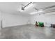 Spacious garage with ample room for storage and a door to the interior of the house at 283 Raynor Rd, Spring Lake, NC 28390