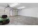 Spacious garage with multiple bays and white walls and ceiling at 283 Raynor Rd, Spring Lake, NC 28390