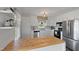 Bright, white kitchen featuring stainless steel appliances and butcher block island adding warmth and functionality at 283 Raynor Rd, Spring Lake, NC 28390