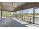 Enjoy outdoor living on this covered screened-in porch with room to entertain at 283 Raynor Rd, Spring Lake, NC 28390