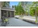 Inviting back deck with comfortable seating and scenic views of the surrounding landscape at 3 Haycox Ct, Durham, NC 27713