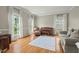 Cozy living room filled with natural light, featuring hardwood floors, and comfortable seating at 3 Haycox Ct, Durham, NC 27713