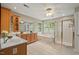 Main bathroom featuring double sinks, a soaking tub, and a separate glass-enclosed shower for added luxury at 3 Haycox Ct, Durham, NC 27713