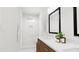 Modern bathroom with glass-enclosed shower, stylish vanity, and contemporary fixtures at 3020 White Rail Dr, Fuquay Varina, NC 27526
