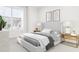 Inviting bedroom featuring a stylish bed, nightstands, lamps, and artwork at 3020 White Rail Dr, Fuquay Varina, NC 27526