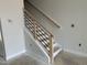 Staircase with modern black railings at 3020 White Rail Dr, Fuquay Varina, NC 27526