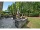 Inviting patio area with outdoor seating and a fire pit, perfect for gatherings at 3029 Willow Ranch Dr, Fuquay Varina, NC 27526