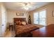Bedroom featuring a bed with decorative pillows and a window with lots of natural light at 3100 Benton Cir, Raleigh, NC 27615