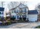 Charming two-story home with manicured landscaping and a well-lit driveway at 3100 Benton Cir, Raleigh, NC 27615