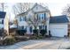 Lovely home with a two-car garage, manicured landscaping, and a welcoming front entrance at 3100 Benton Cir, Raleigh, NC 27615