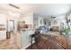 Open concept living room and kitchen area with breakfast bar seating at 3100 Benton Cir, Raleigh, NC 27615