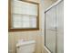 Bathroom featuring a toilet and shower/tub combination with a window to provide natural light at 3121 Blue Hill Ln, Durham, NC 27703