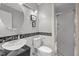 Bright, modern bathroom with glass shower, vessel sink, and decorative mosaic border at 33 Stoneridge Cir, Durham, NC 27705