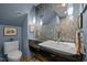 Stylish bathroom featuring a modern sink, unique backsplash and elegant pendant lighting at 33 Stoneridge Cir, Durham, NC 27705