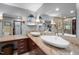 Bathroom with double sinks, granite countertops, and a glass-enclosed shower at 33 Stoneridge Cir, Durham, NC 27705