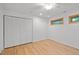 Bedroom with closet, hardwood floors, recessed lighting and updated window frames at 33 Stoneridge Cir, Durham, NC 27705