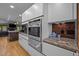 Contemporary kitchen design with built-in stainless appliances, modern cabinetry, and decorative backsplash at 33 Stoneridge Cir, Durham, NC 27705