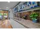 Modern kitchen with updated appliances, sleek countertops, and custom cabinets with glass displays at 33 Stoneridge Cir, Durham, NC 27705