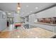 Spacious kitchen features granite countertops, stainless steel appliances, and custom lighting at 33 Stoneridge Cir, Durham, NC 27705