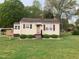 Charming single Gathering home with well-kept front yard at 335 Ashley Ave, Timberlake, NC 27583