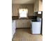 Modest kitchen features a double basin sink and ample cabinet space at 335 Ashley Ave, Timberlake, NC 27583