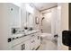 Bathroom with double vanity, granite countertop and shower-tub combination at 353 Murray Grey Ln, Wake Forest, NC 27587