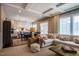 Open-concept living room and kitchen area with lots of natural light at 353 Murray Grey Ln, Wake Forest, NC 27587