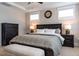 Comfortable main bedroom featuring a king-size bed, dresser and bench at 353 Murray Grey Ln, Wake Forest, NC 27587