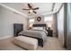Comfortable main bedroom featuring a king-size bed, dresser and bench at 353 Murray Grey Ln, Wake Forest, NC 27587