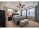 Comfortable main bedroom featuring a king-size bed, dresser and bench at 353 Murray Grey Ln, Wake Forest, NC 27587
