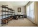 Bright home office featuring neutral walls, carpet, and a large window for natural light at 353 Murray Grey Ln, Wake Forest, NC 27587