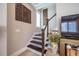 Elegant staircase with decorative wall art at 353 Murray Grey Ln, Wake Forest, NC 27587