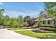 Two-story home with well-maintained landscaping and a beautiful lawn at 40 Farrells Creek Rd, Apex, NC 27523