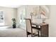 A bright office with natural light, a desk and neutral carpet at 40 Farrells Creek Rd, Apex, NC 27523