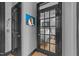 Beautiful bedroom visible through paneled black door that adds architectural interest at 400 W North St # 1420, Raleigh, NC 27603