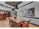 Charming dining room with unique art, wood floors, and modern lighting fixtures at 400 W North St # 1420, Raleigh, NC 27603
