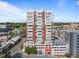Stunning exterior of this contemporary condo building featuring red brick and many windows at 400 W North St # 1420, Raleigh, NC 27603