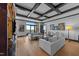 Living room with hardwood floors and coffered ceilings with a picturesque window view at 400 W North St # 1420, Raleigh, NC 27603