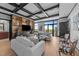 Bright living room with built-in shelving, hardwood floors, and expansive views at 400 W North St # 1420, Raleigh, NC 27603