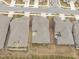 An overhead view showing the layout of homes with patios and driveways in a neatly planned community at 421 Raven Cliff St, Apex, NC 27523