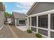 Lovely outdoor space featuring a screened porch and an open patio, perfect for entertaining at 421 Raven Cliff St, Apex, NC 27523