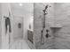Bathroom showcasing walk-in shower with gray subway tile and modern shower head at 421 Raven Cliff St, Apex, NC 27523