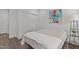 Bedroom featuring stylish decor, hardwood floors, and closet at 421 Raven Cliff St, Apex, NC 27523
