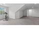 Bonus room featuring neutral carpet, white trim, and a window with natural light at 421 Raven Cliff St, Apex, NC 27523
