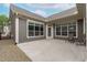 Spacious outdoor patio area with seating and ample natural light, great for entertaining guests at 421 Raven Cliff St, Apex, NC 27523